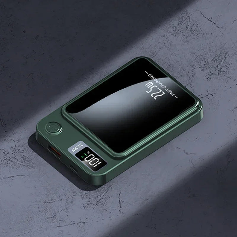 Dark green, rectangular magnetic power bank with a digital display showing 100% battery and 22.5W fast charging.