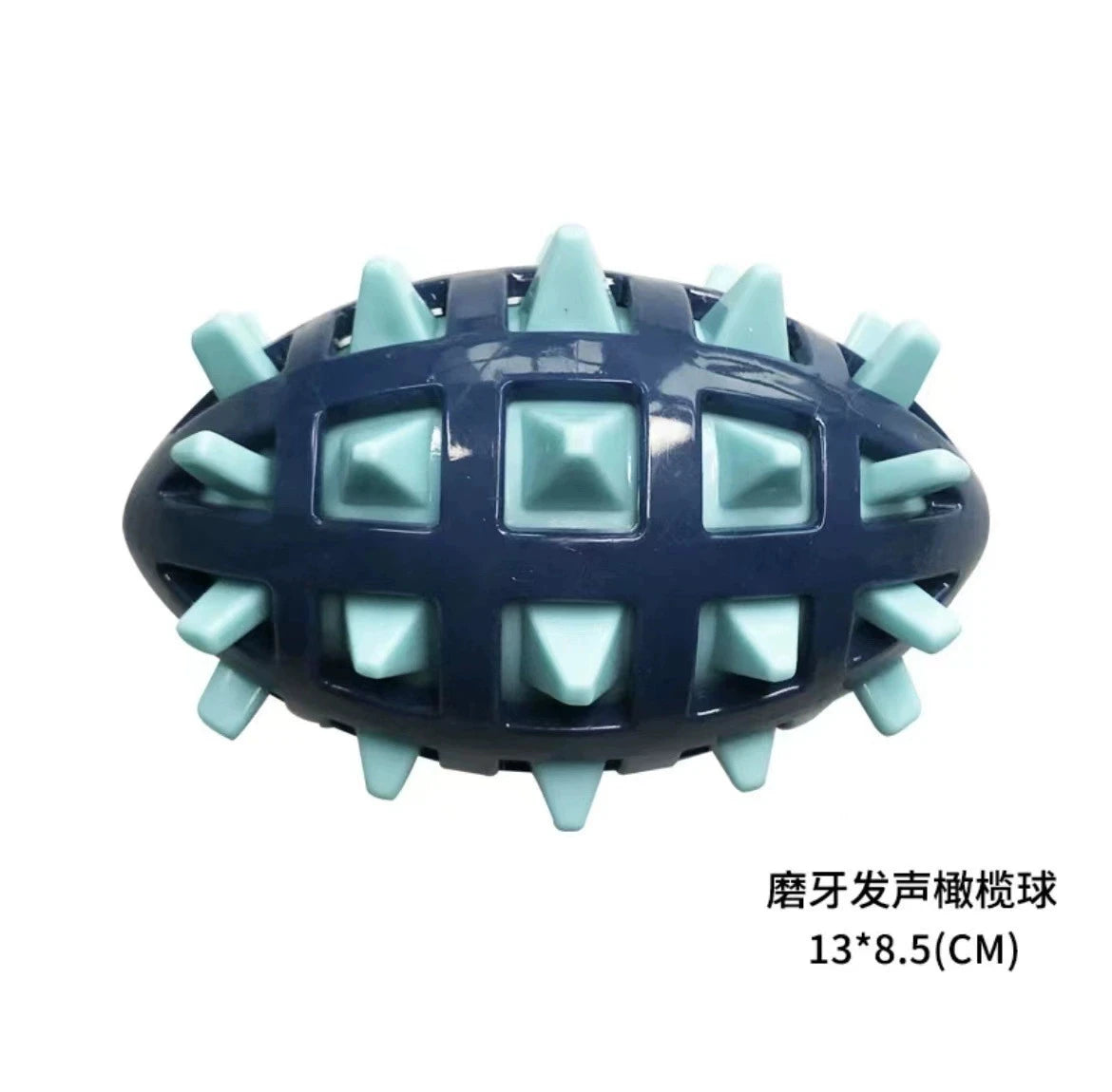 Durable navy and light blue rubber rugby ball dog toy with a textured, spiky grid design.