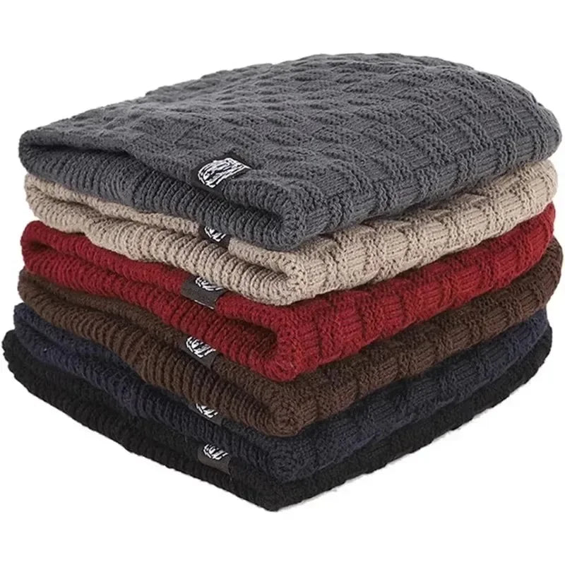 A stack of six unisex winter beanie hats in assorted colours, featuring a textured cable-knit pattern.
