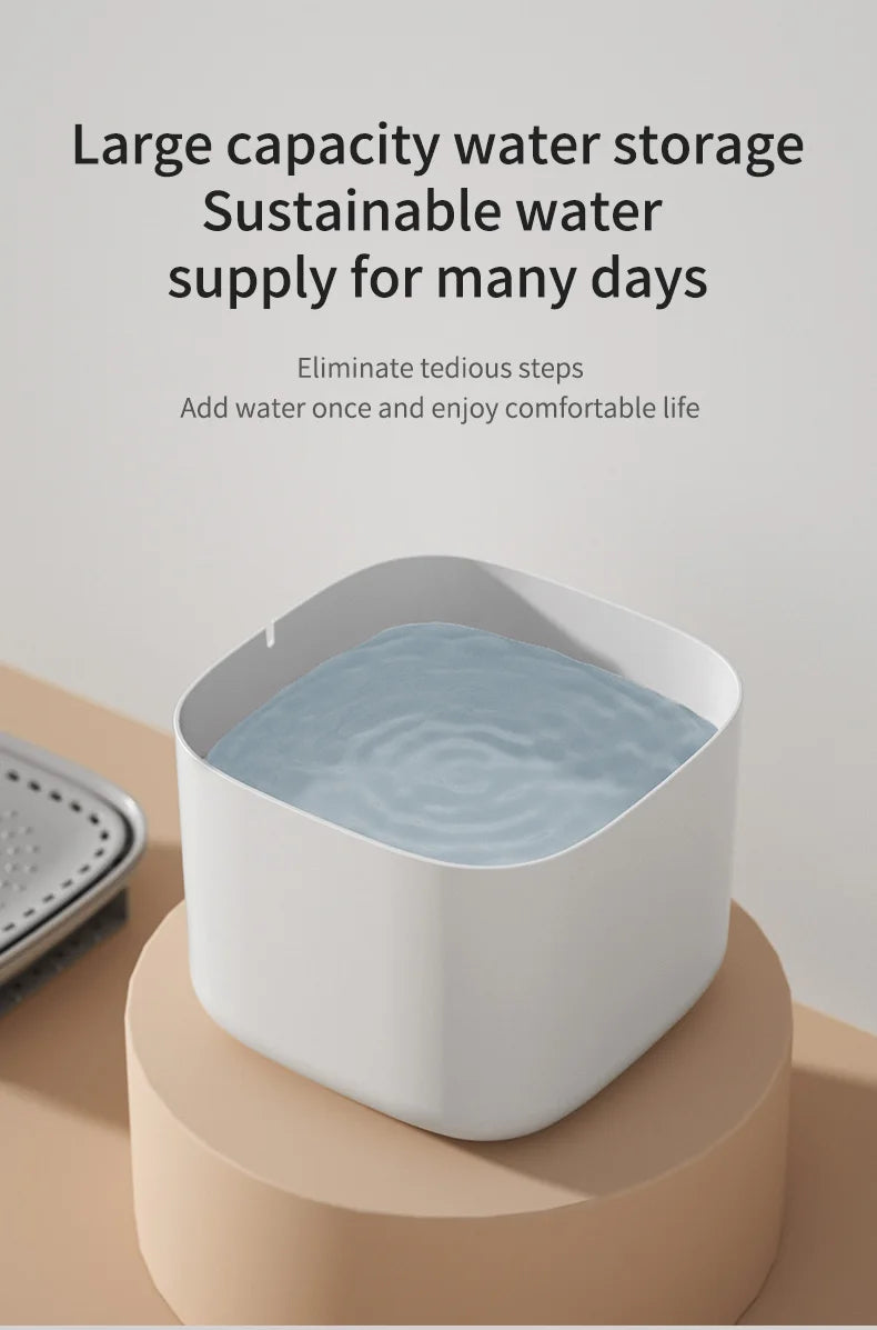 Minimalist square white water dispenser for pets, featuring a clean, modern design on a circular tan stand.