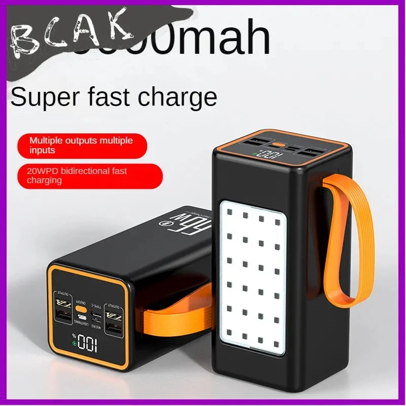 Black and orange portable power bank featuring a built-in LED light panel, carry strap, and digital battery display.