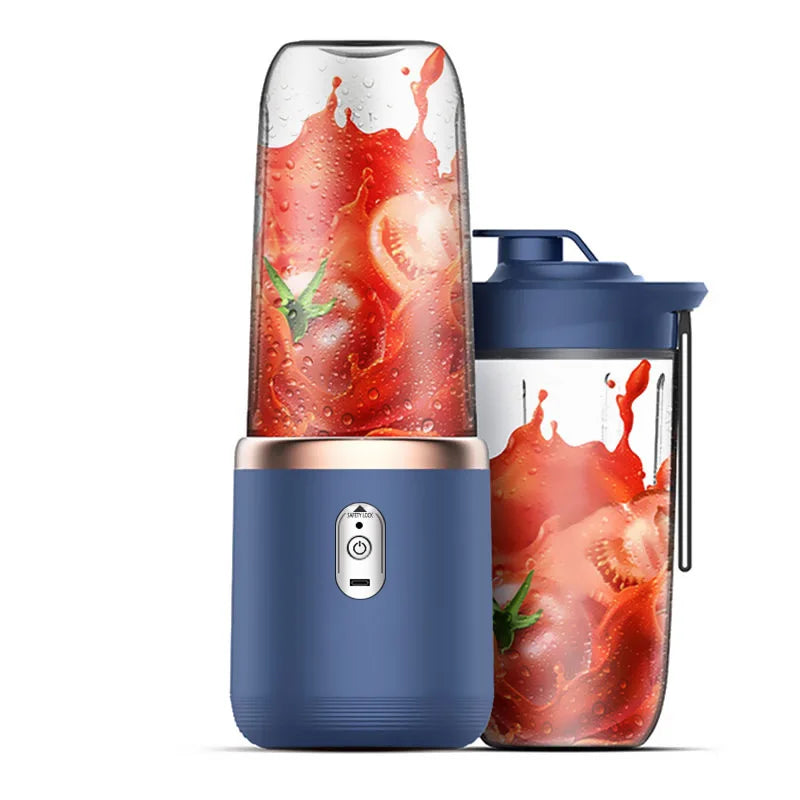 Portable blue personal blender with rose gold accents and a travel lid, containing tomato juice, on a white background.