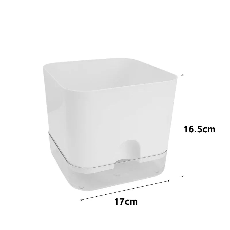 Square white self-watering plastic planter with a clear base, labeled with 16.5cm height and 17cm width.
