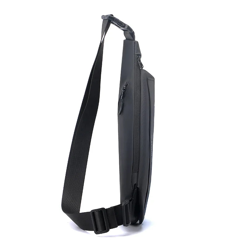 Side view of a slim black anti-theft crossbody sling bag with an adjustable strap and secure zip compartments.