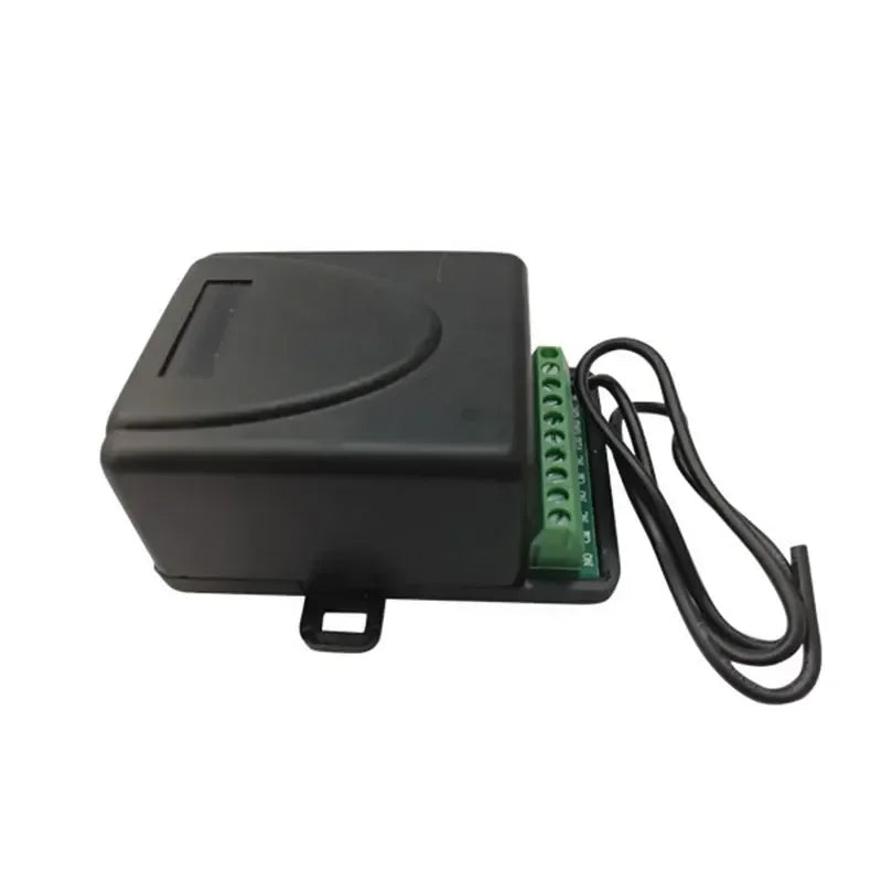 Black plastic electronic control box with a green terminal block and attached wiring on a white background.
