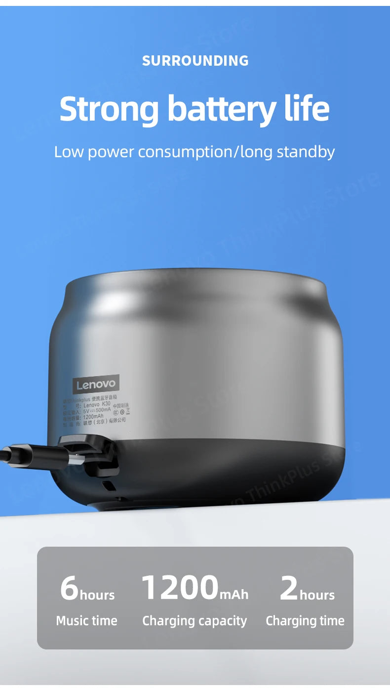 Silver and black portable wireless speaker being charged via USB cable. Features 6-hour playback and 1200mAh battery.