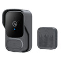 Smart charcoal grey wireless video doorbell with camera lens, status light, bell button, and matching square chime unit.
