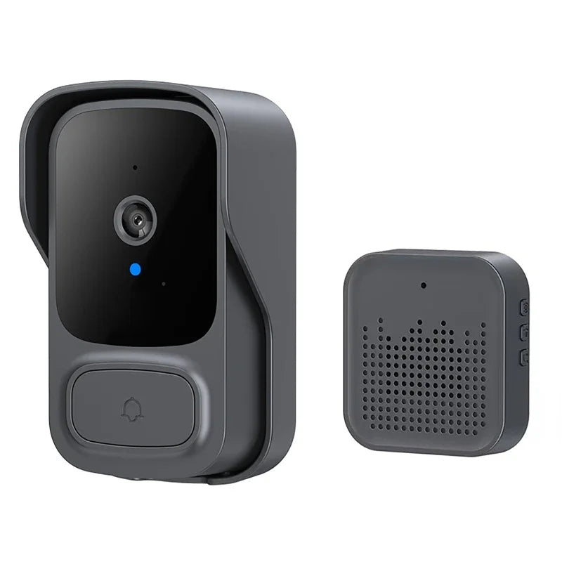 Smart charcoal grey wireless video doorbell with camera lens, status light, bell button, and matching square chime unit.