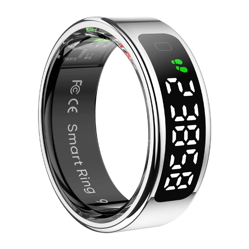 Sleek silver smart ring with an integrated digital display showing step count and health tracking metrics.