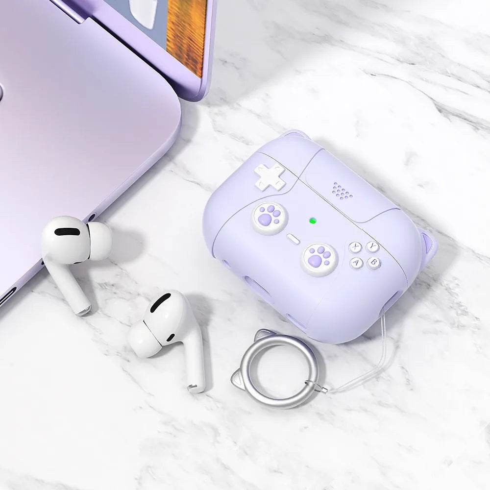 Lilac silicone AirPods Pro case shaped like a gaming controller with cat-ear detail and a ring keyring.