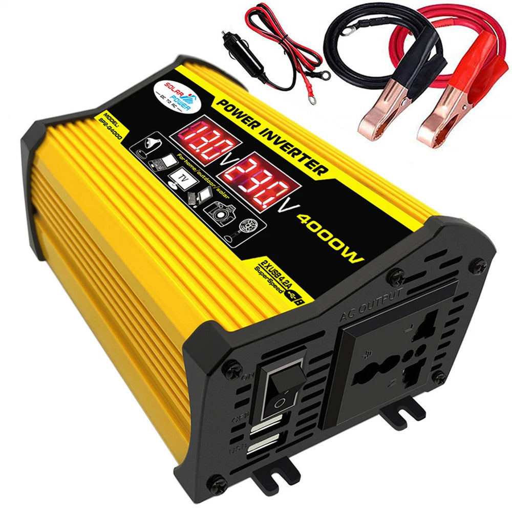 Yellow portable power inverter with digital display, AC outlet, dual USB ports, and included car battery clip cables.