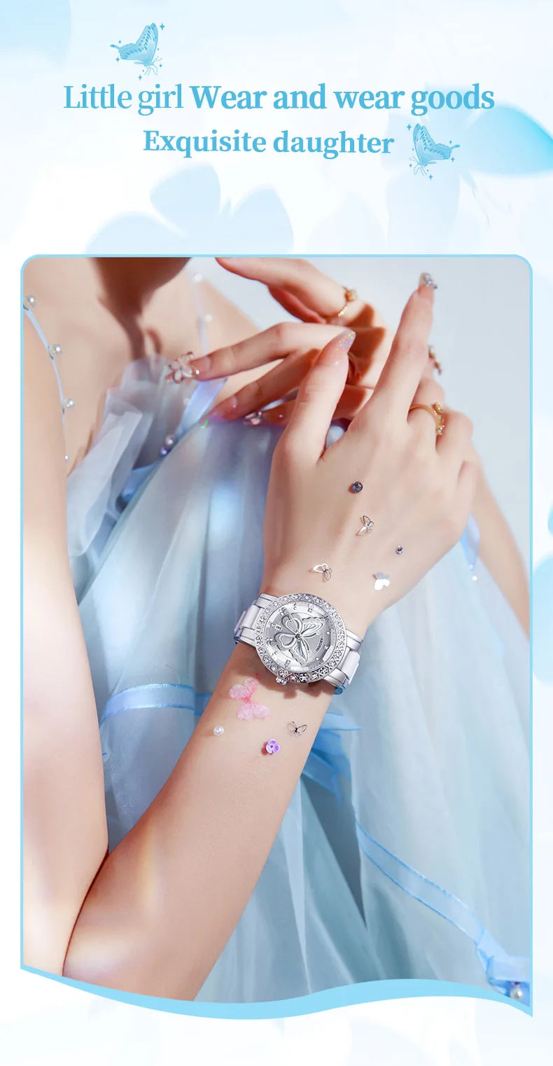 Elegant silver women’s wristwatch featuring a butterfly dial and a sparkling crystal-encrusted bezel.