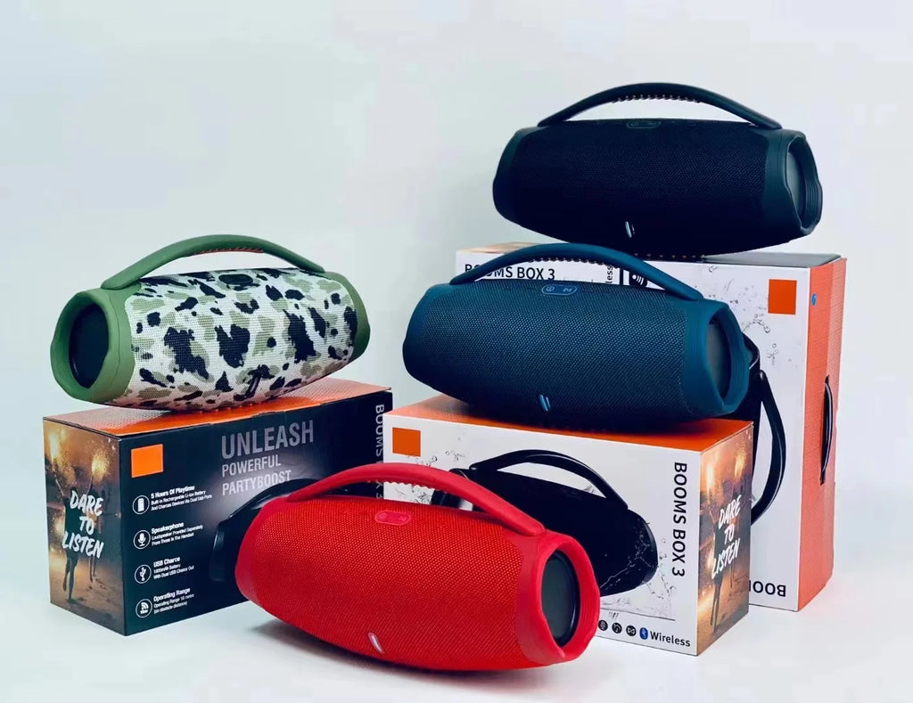 Four portable, cylindrical Bluetooth speakers in camo, red, navy, and black, each with a top handle and RGB lighting.