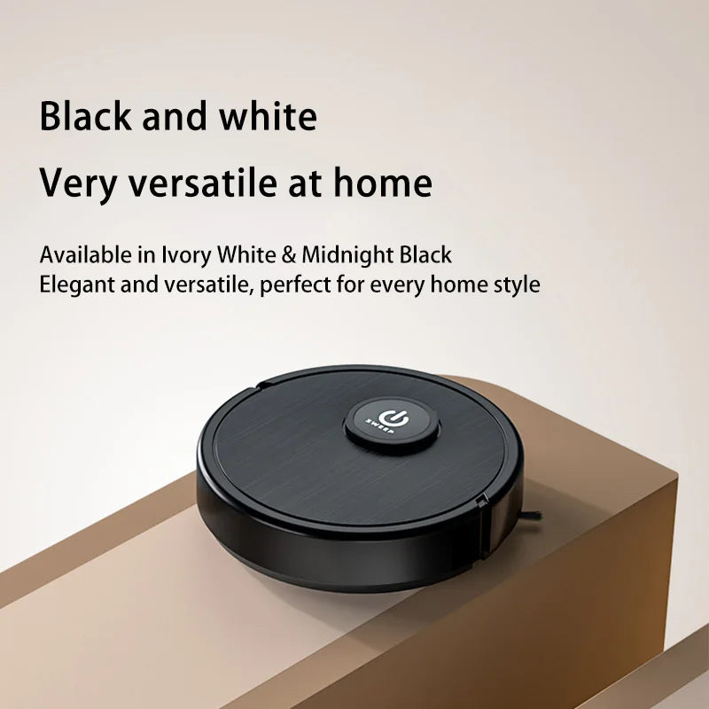 A black robotic vacuum with a power button sits on a beige surface with promotional text.