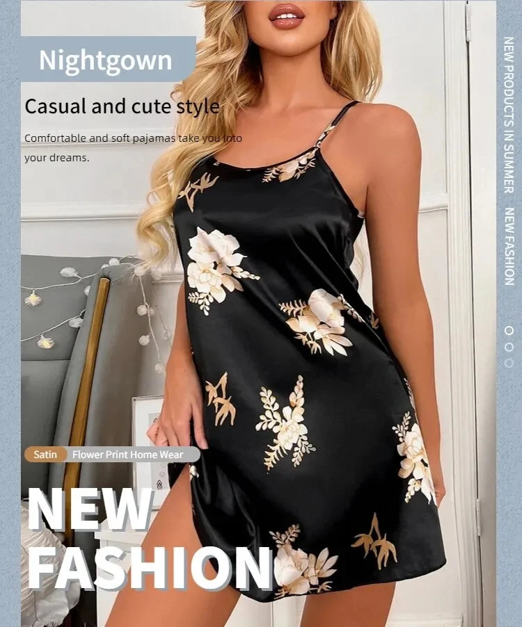 Black satin nightgown with floral print, spaghetti straps, and a comfortable, relaxed fit.