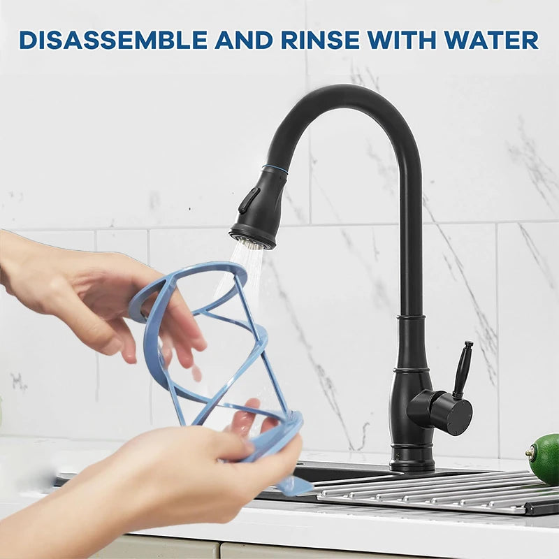 A blue plastic slushie machine auger being rinsed under a kitchen tap.