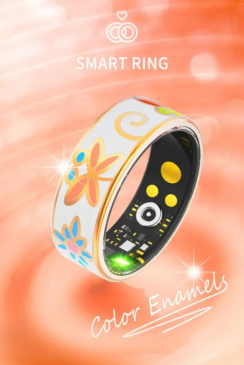 White health tracking ring with gold edges and colourful floral enamel patterns, featuring interior sensor lights.