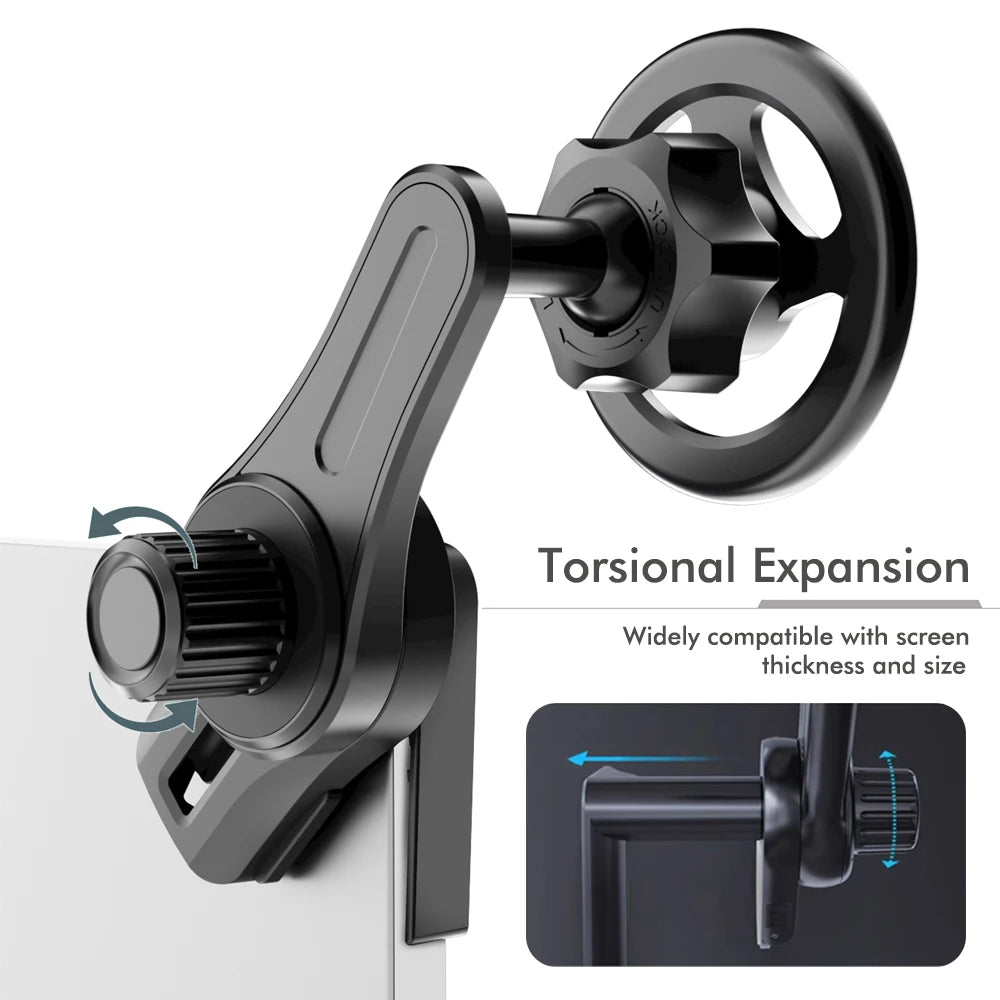 Black adjustable monitor mount with a clamp design, circular locking knob, and a sleek, modern technical appearance.