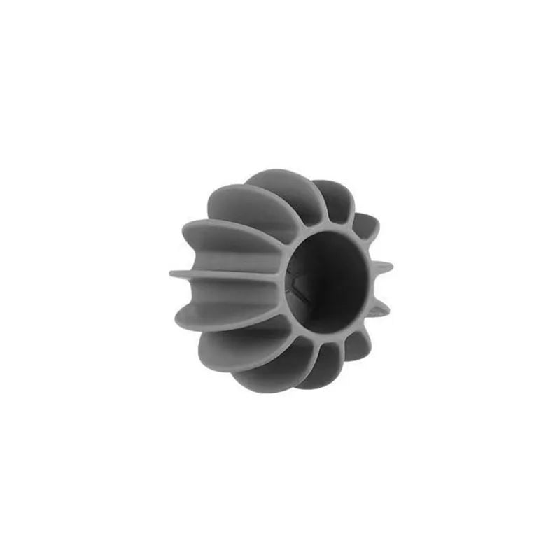Grey silicone laundry dryer ball with a unique, ridged, flower-like design against a plain white background.