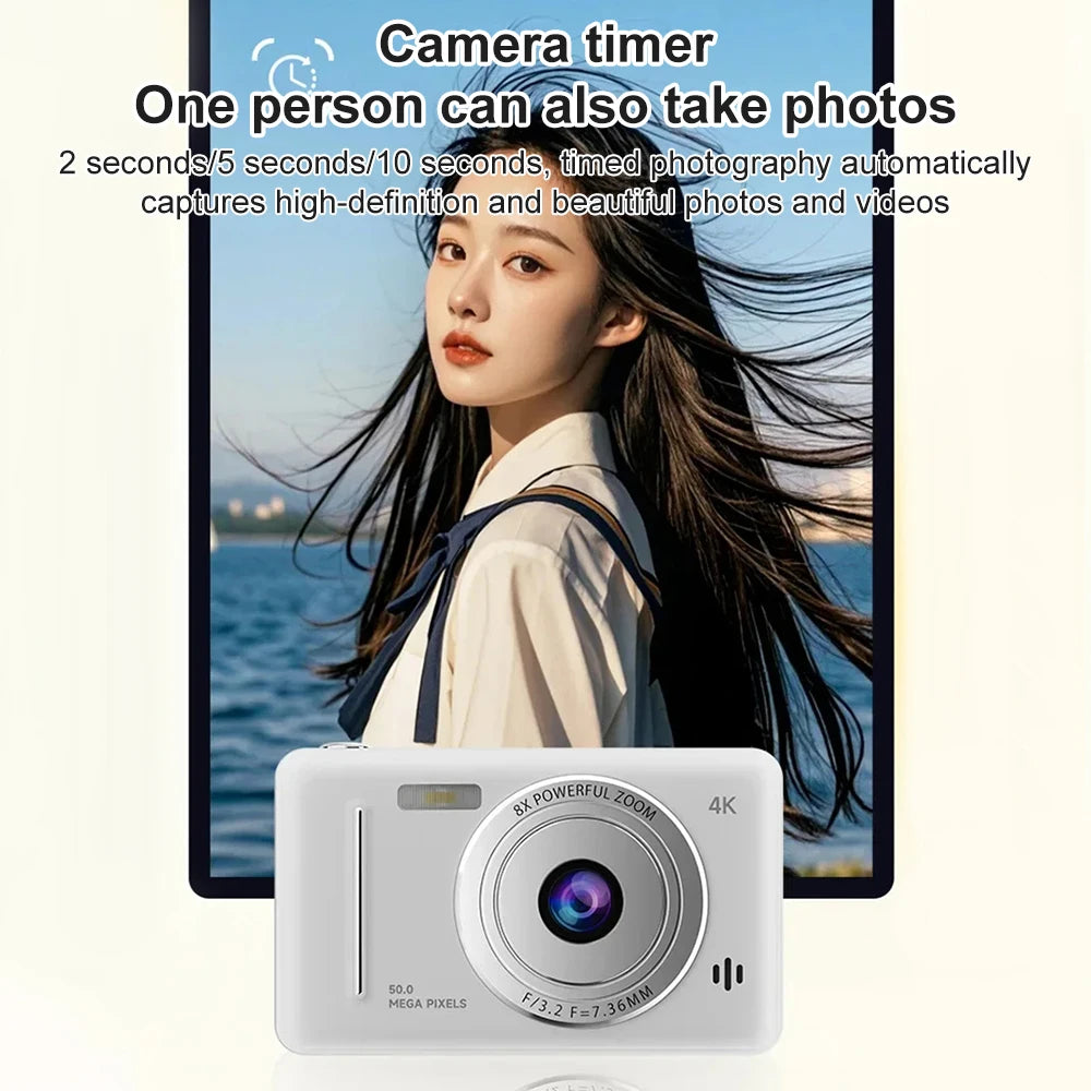White digital camera with 4K resolution, 50MP sensor, and 8X zoom lens, featuring a camera timer function.