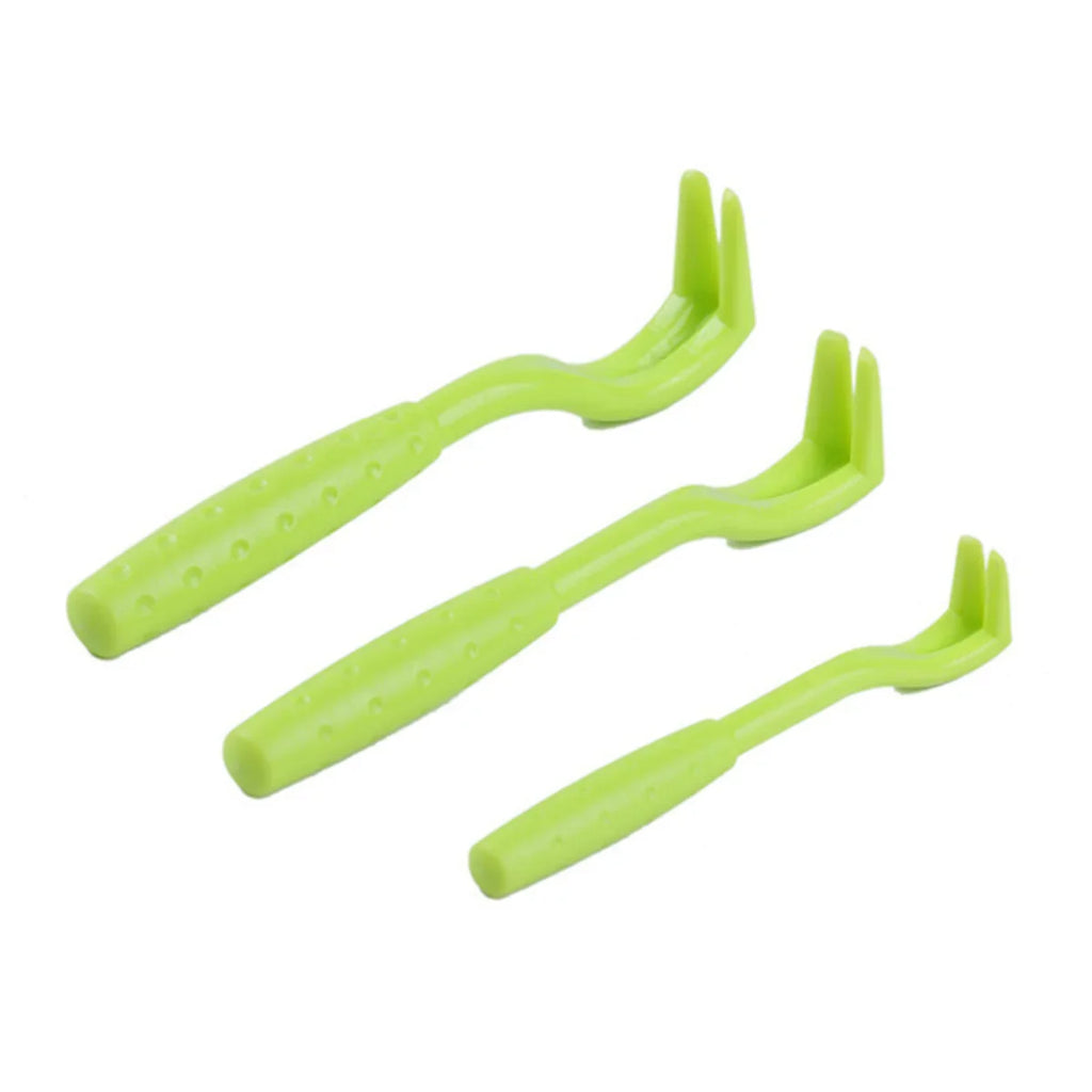 Three lime green plastic tick removal tools of varying sizes, featuring textured handles and forked heads.