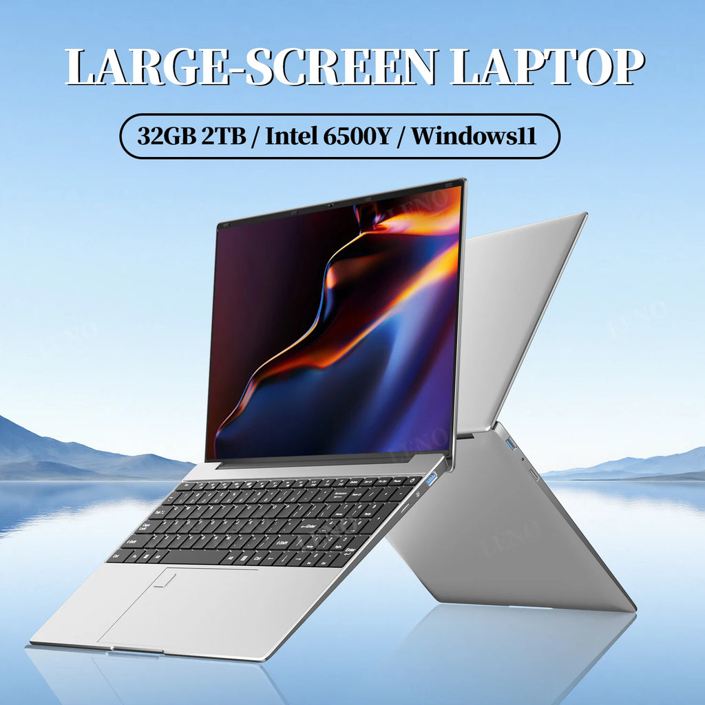Sleek silver 15.6-inch laptop with a black keyboard, 32GB RAM, 2TB SSD, and Windows 11.
