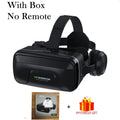Black VR headset with adjustable head straps and built-in headphones, shown with its retail box and a gift box.