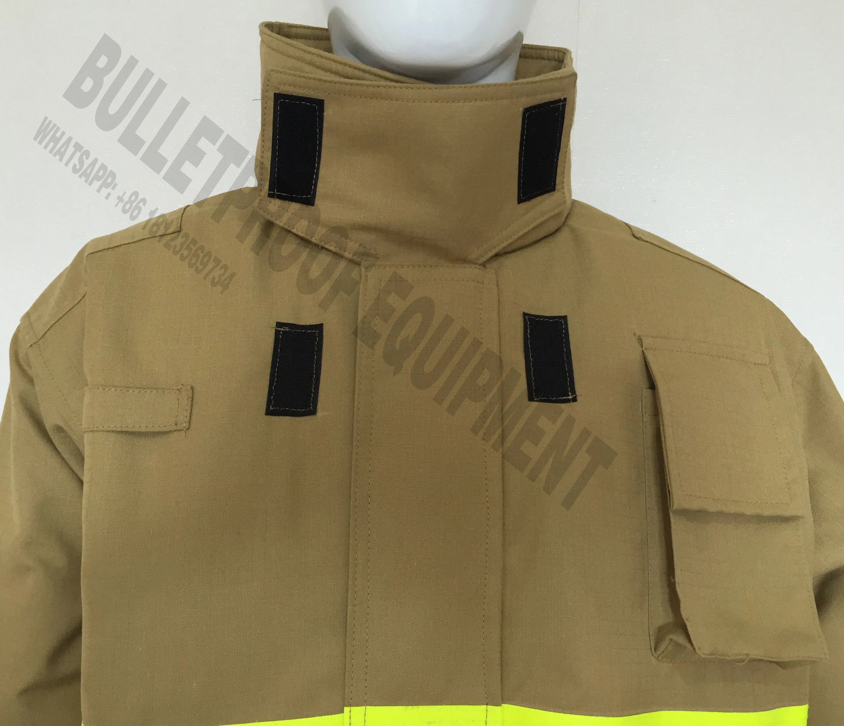 Tan fire-resistant fabric jacket with a high collar, black velcro closures, and a chest utility pocket.