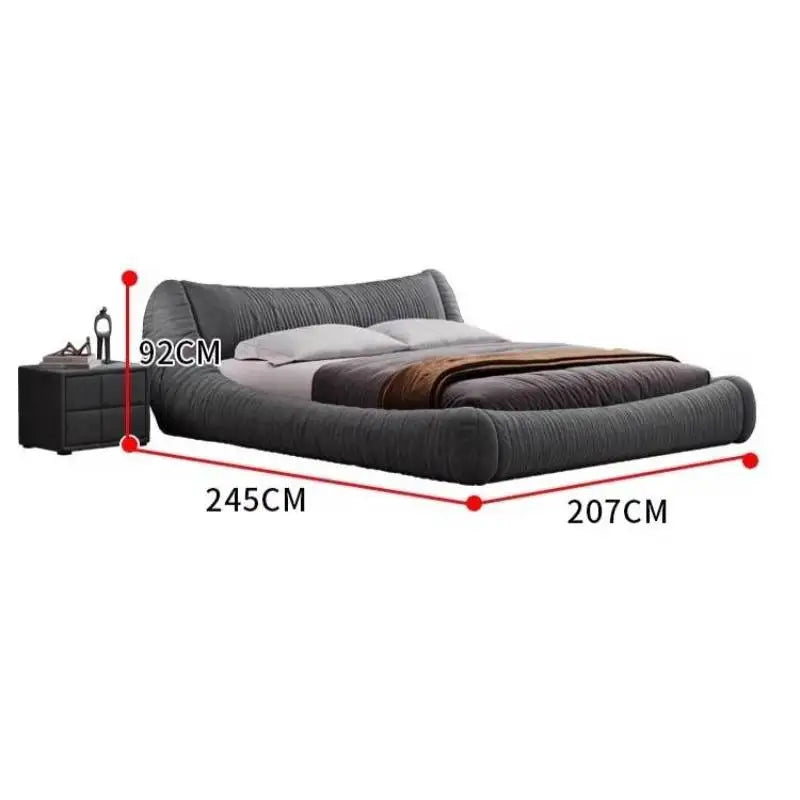 Contemporary dark grey upholstered bed frame with a curved headboard and matching bedside table, shown with dimensions.