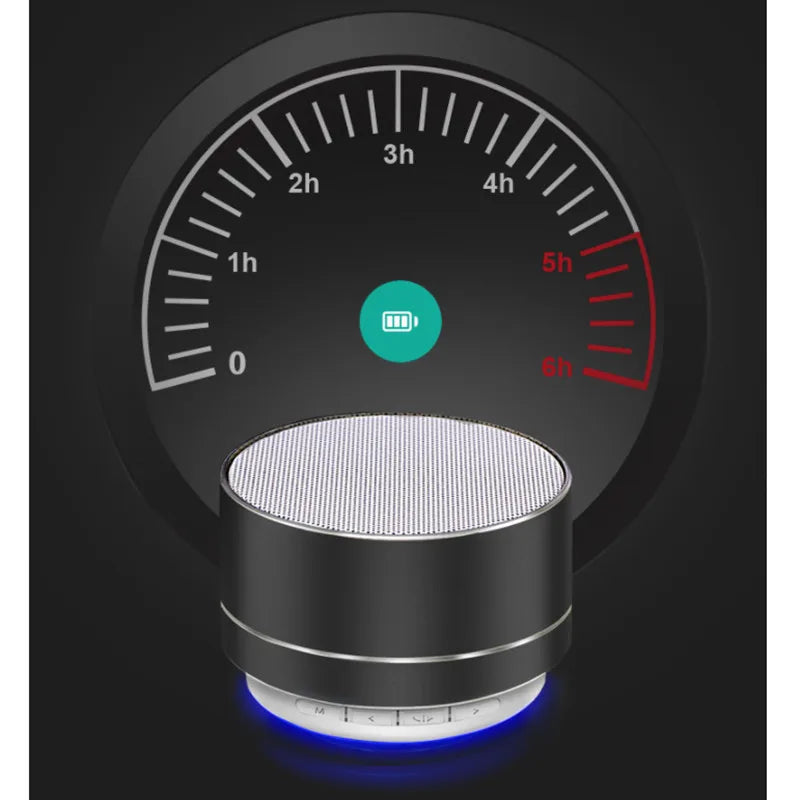 Black aluminium portable Bluetooth speaker with a glowing blue LED light base and a battery life indicator.