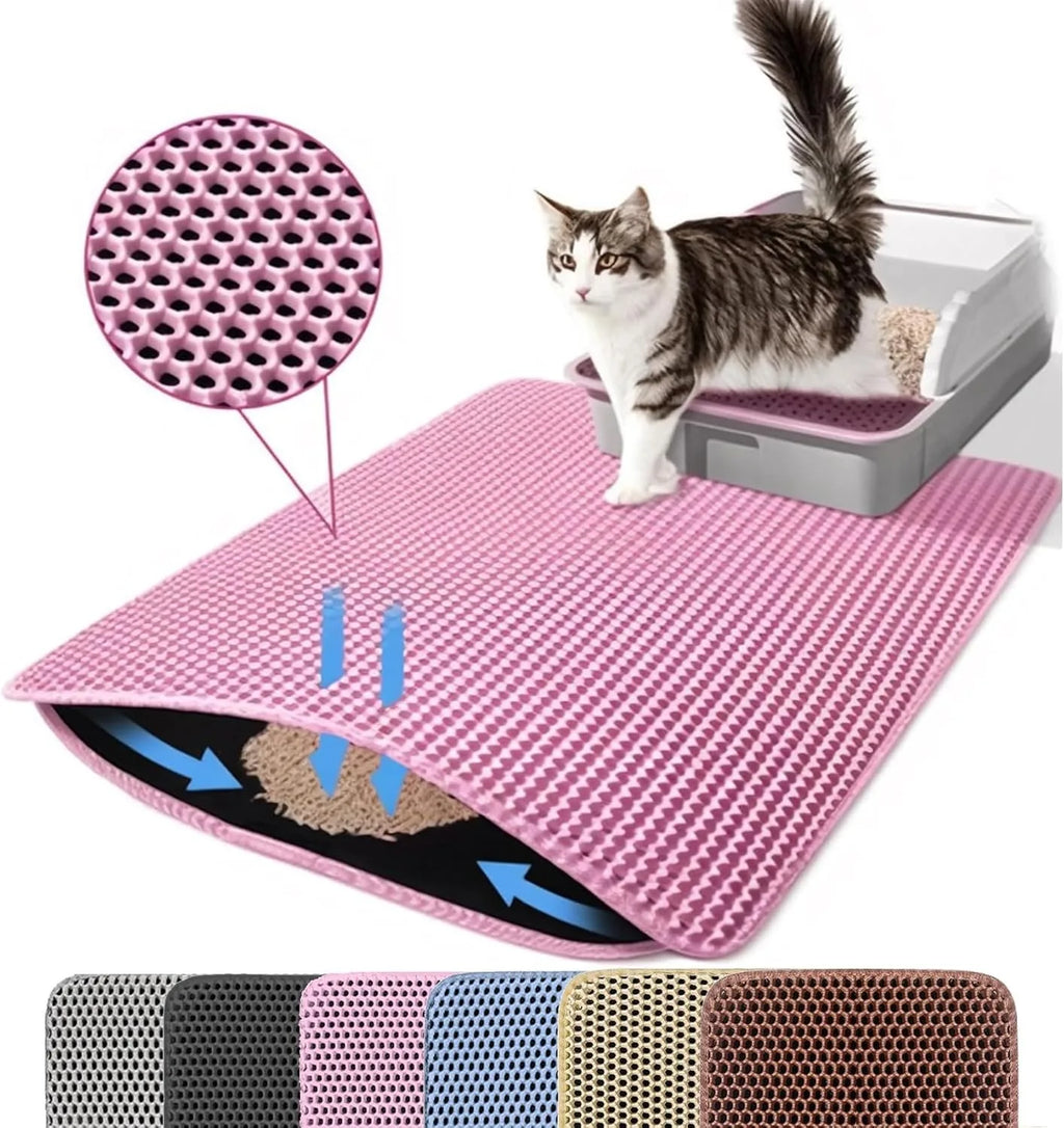 Pink double-layer cat litter mat with honeycomb top, non-slip design, and trapped litter particles, shown with a cat.