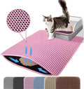 Pink double-layer cat litter mat with honeycomb top, non-slip design, and trapped litter particles, shown with a cat.