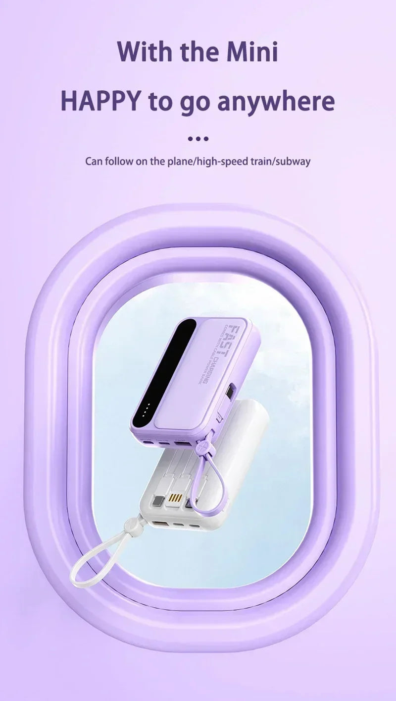 Compact, lilac-coloured portable power bank featuring built-in charging cables and a handy carry loop.