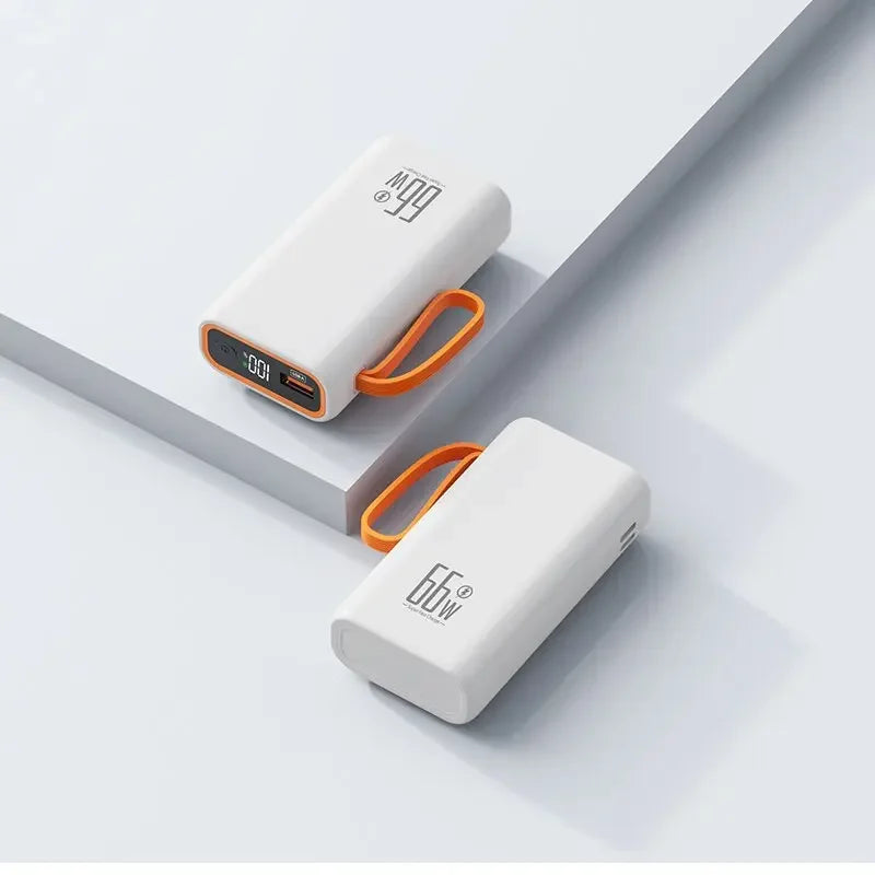 Two white 20000mAh portable power banks with 66W branding, orange carry straps, and a digital LED battery display.