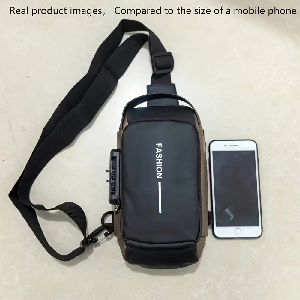 Black and brown anti-theft sling bag with a combination lock, shown next to a mobile phone for size reference.