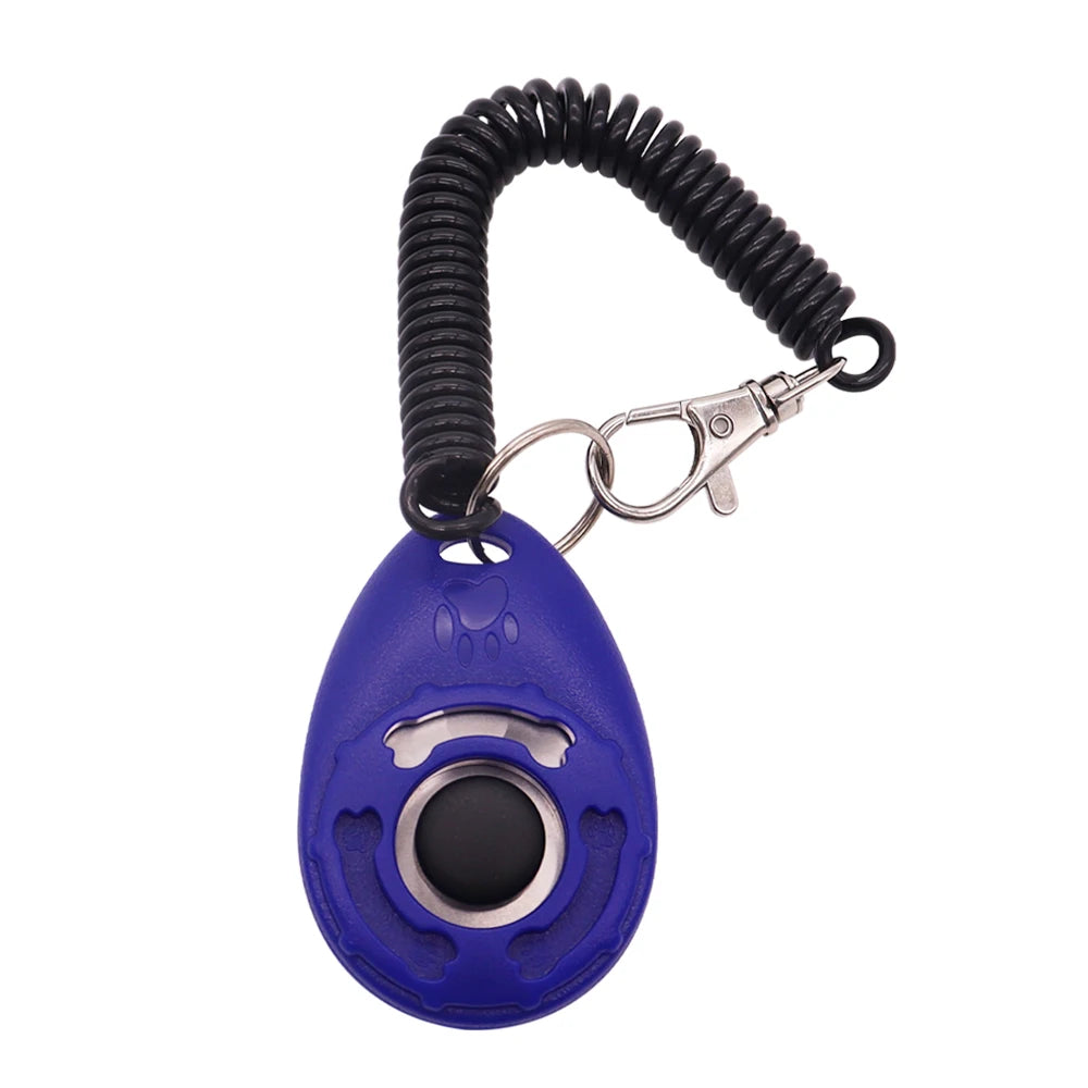 Blue teardrop-shaped dog training clicker with a central button, paw print detail, and black coiled wrist strap.