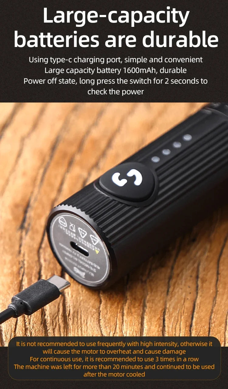 Black, cylindrical handheld device with a ribbed texture, a power button, LED indicators, and a USB-C charging port.