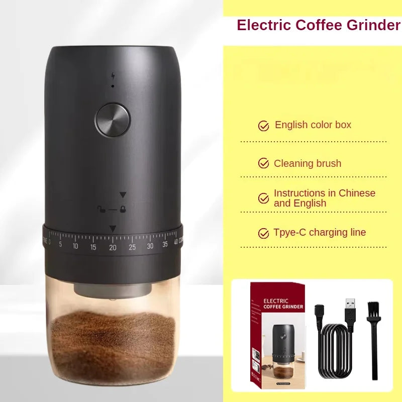 Matte black portable electric coffee grinder with a clear base, grind adjustment dial, charging cable, and brush.