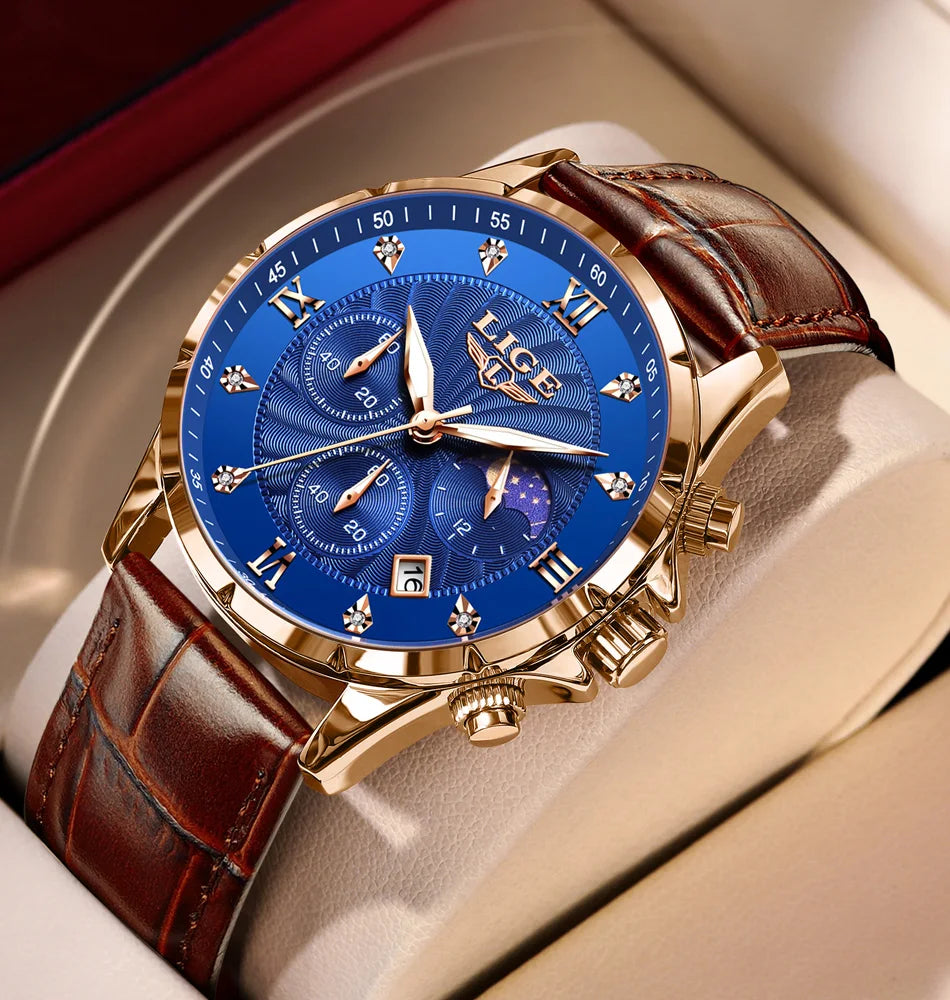 Men’s gold-tone chronograph watch with a textured blue dial, Roman numerals, moon phase, and brown leather strap.