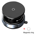 Black magnetic car phone mount with a twist-lock mechanism and a separate metallic adhesive ring.