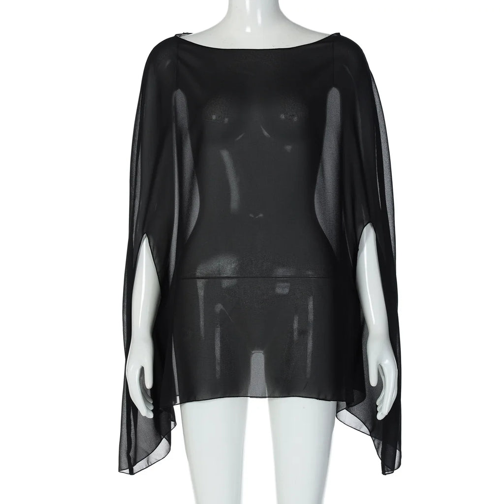 Sheer black chiffon poncho top with a wide boat neckline and loose, flowing cape-style sleeves.