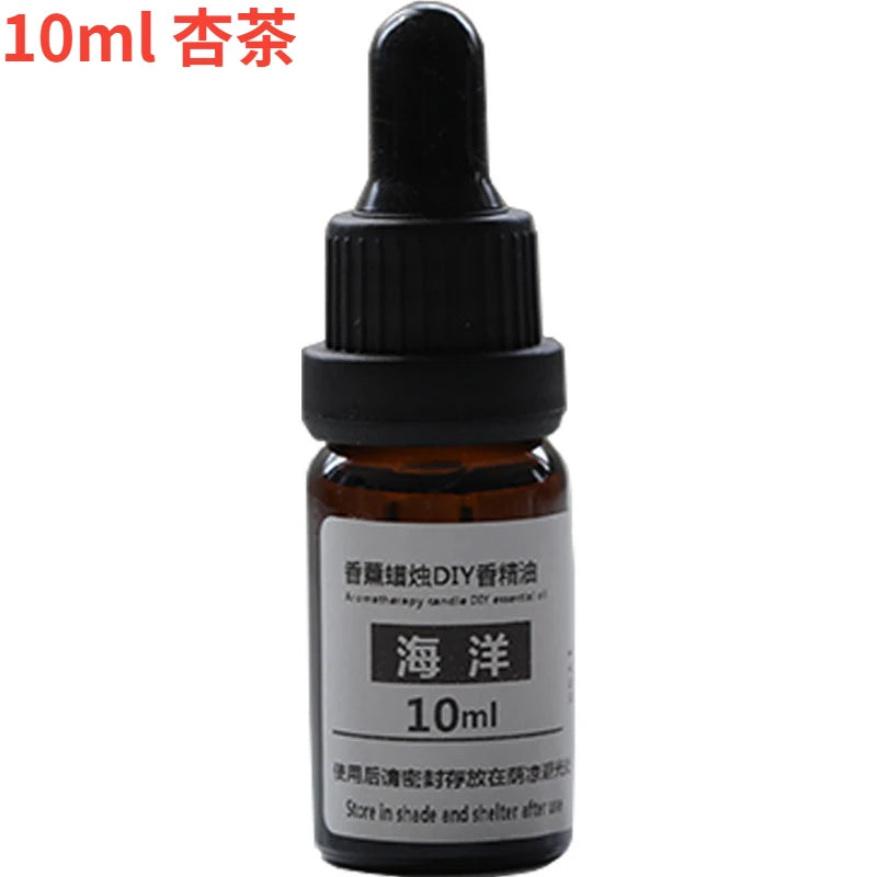 10ml amber glass essential oil bottle with a black dropper cap and a white label, isolated on a white background.