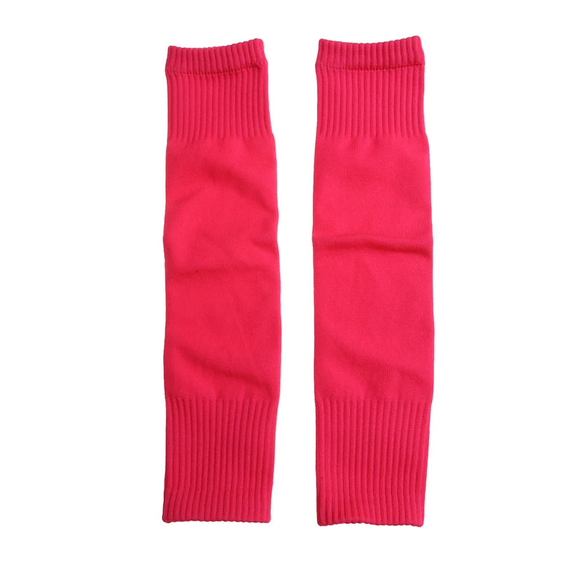 A pair of bright pink, footless leg warmers featuring ribbed elastic cuffs at the top and bottom.