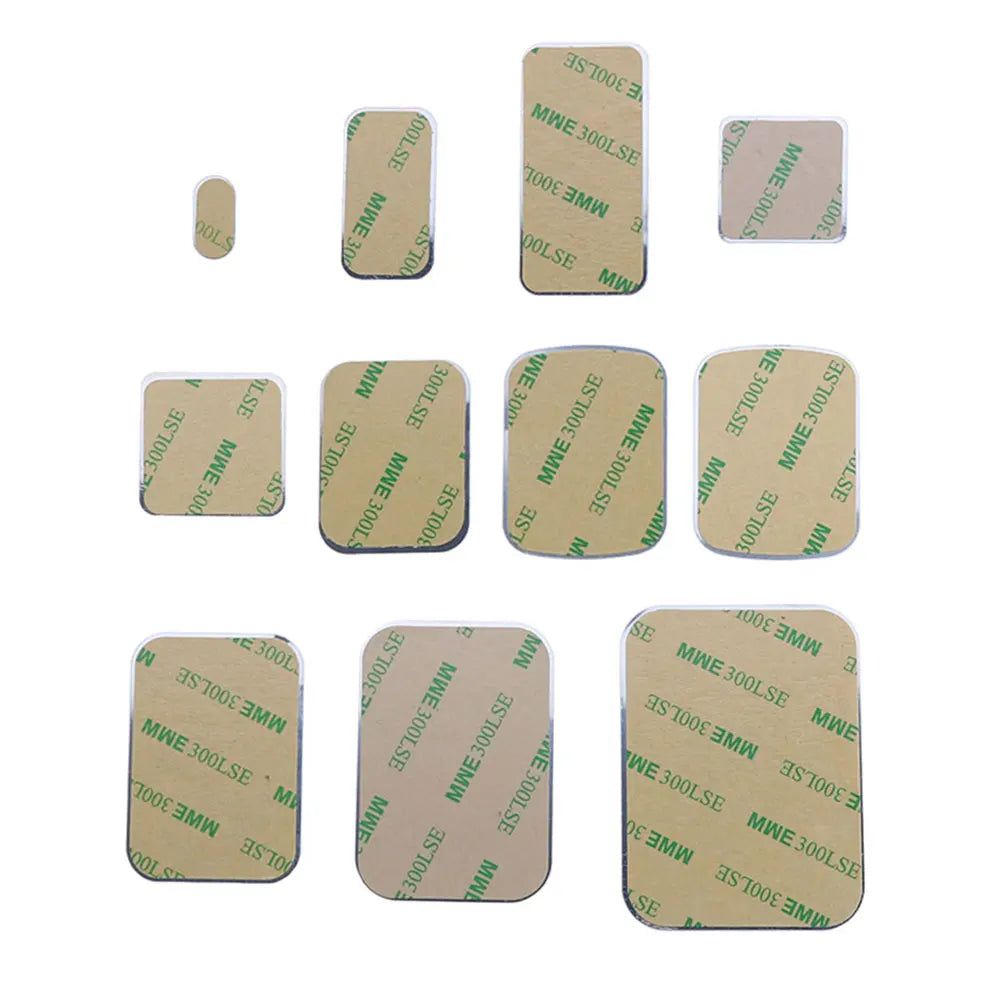 Assorted rectangular adhesive pads with rounded corners, featuring tan backing paper and silver metal edges.