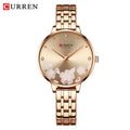 CURREN rose gold ultra-thin quartz watch with round dial, pink flower print, and crystal hour markers.