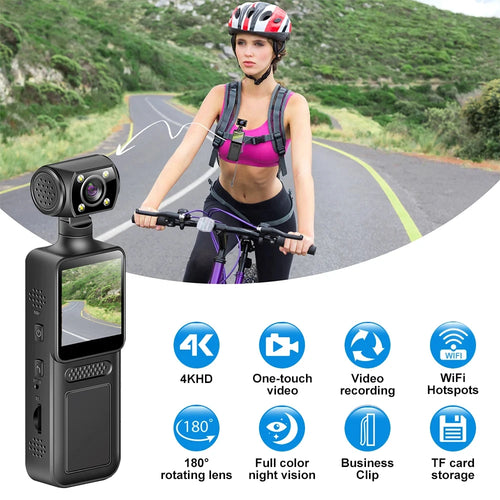 Black plastic 4K body-worn video camera with a 180-degree rotating lens, screen, and clip, worn by a female cyclist.