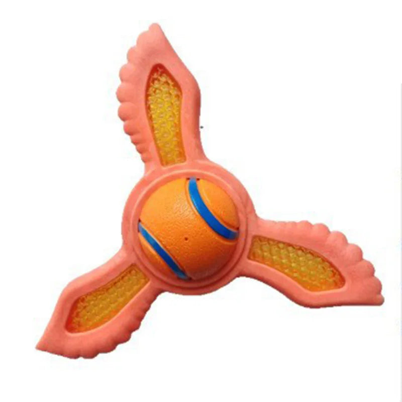 Pink three-bladed floating dog toy with a central orange ball featuring blue stripes and textured yellow inserts.
