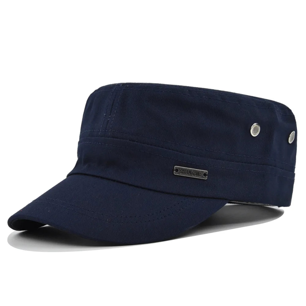 Navy blue military-style flat cap with a short peak and silver-tone metal ventilation eyelets.