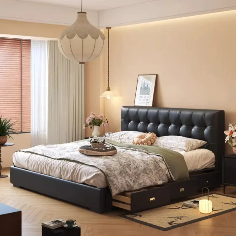 Minimalist black upholstered storage bed frame with a tufted headboard and integrated side drawers in a modern bedroom.