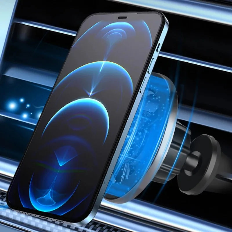 A smartphone magnetically mounted to a car air vent, featuring a modern silver design and glowing blue light effects.